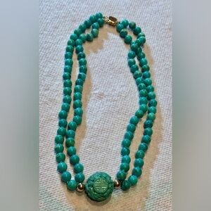 Natural turquoise beads double strand w/ carved center & 14 beads, clasp 18”